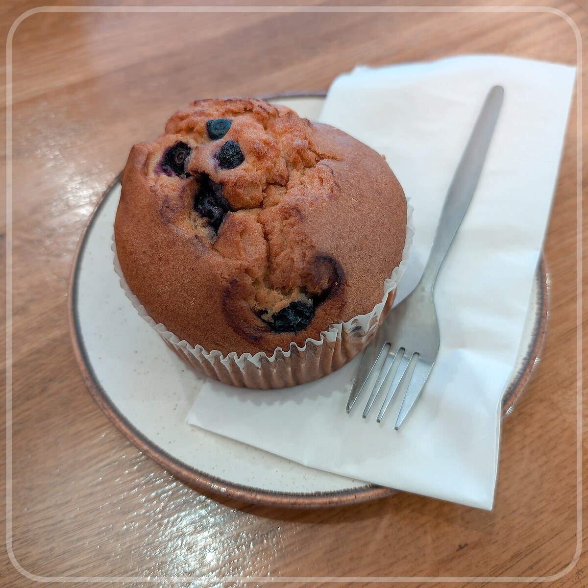A plated serving of Blueberry Muffins