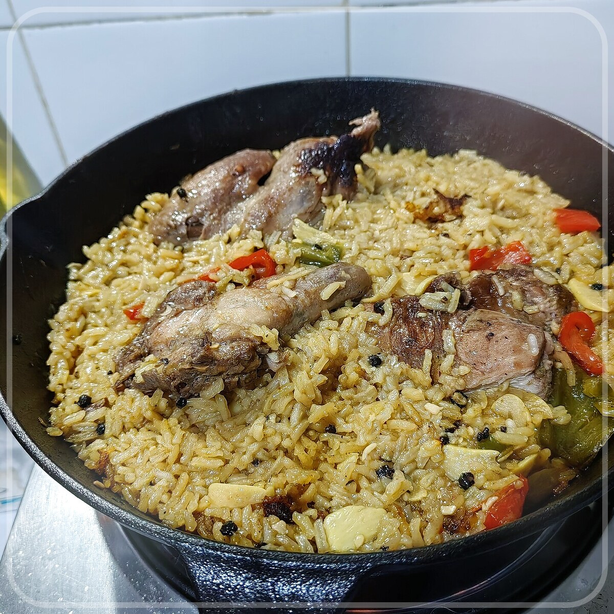A plated serving of Chicken Paella