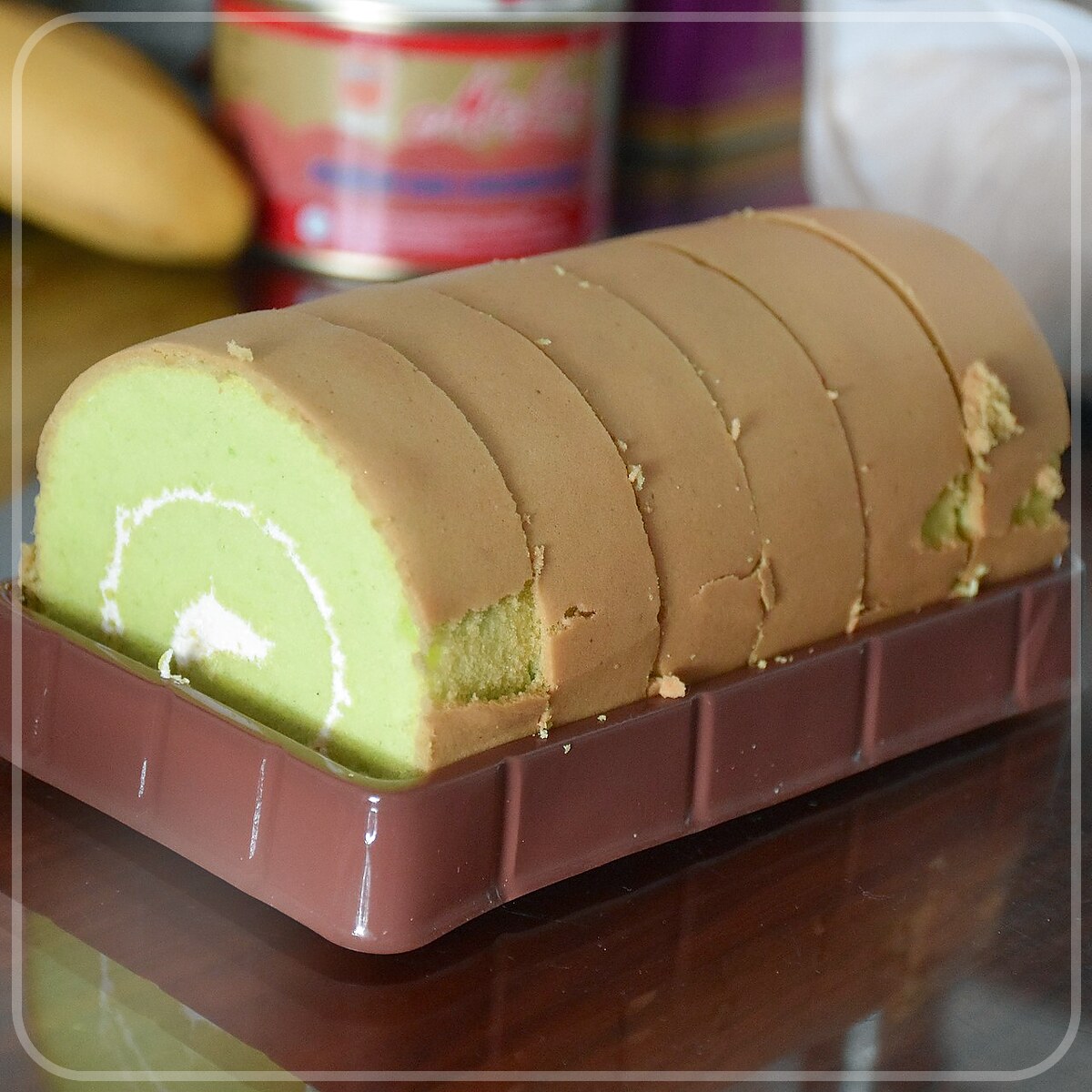 A plated serving of Jelly Roll Cake