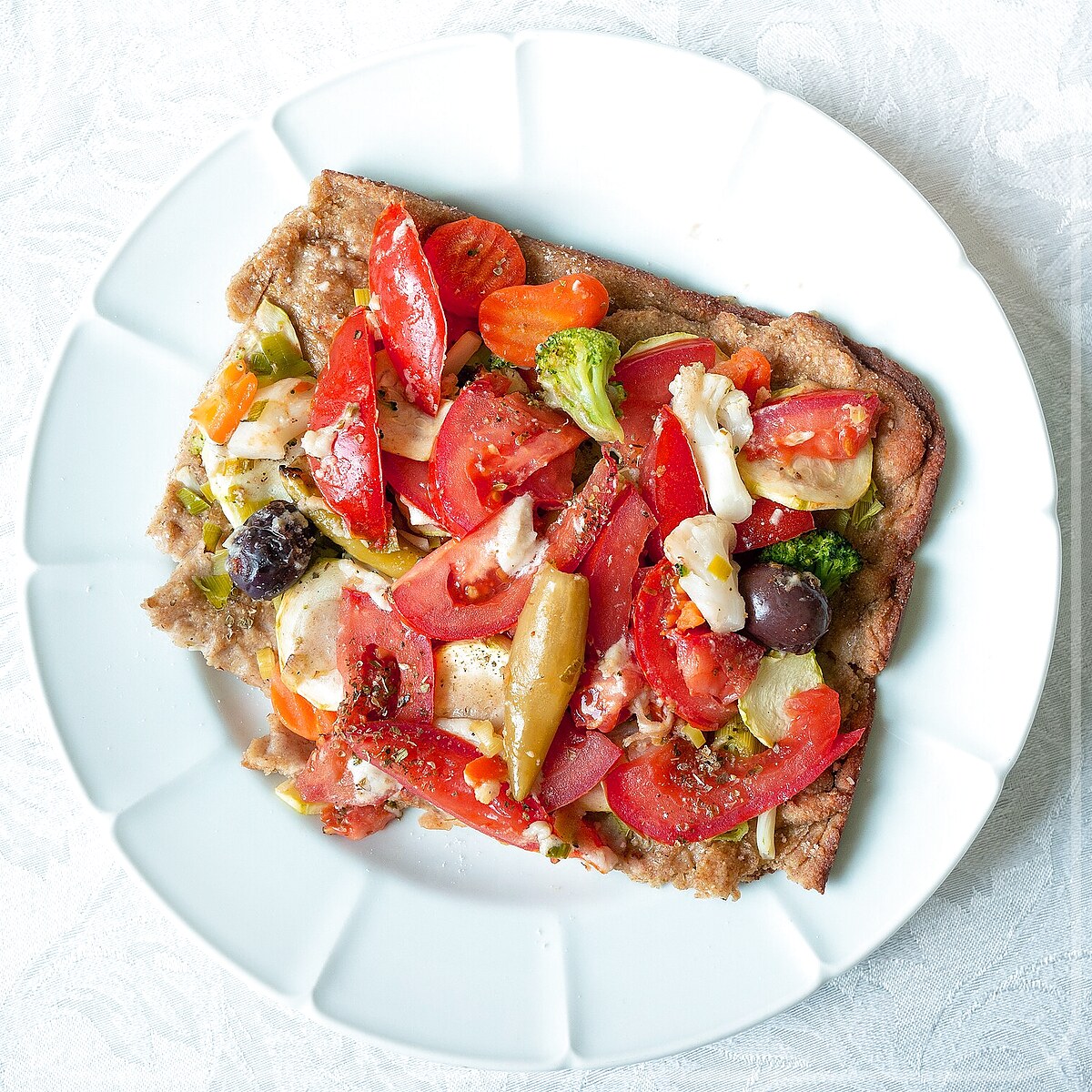 A plated serving of Pizza