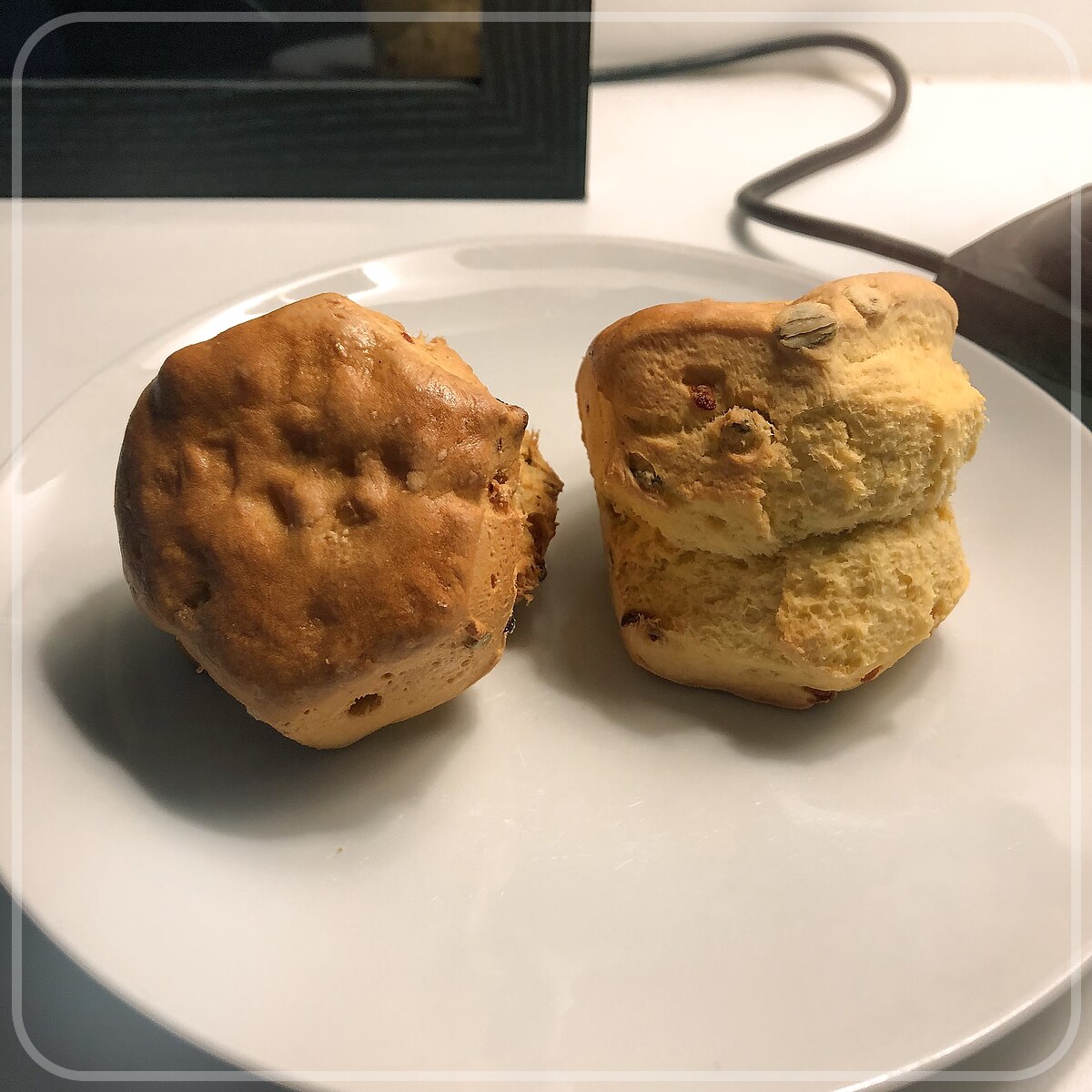 A plated serving of Pumpkin Raisin Scones
