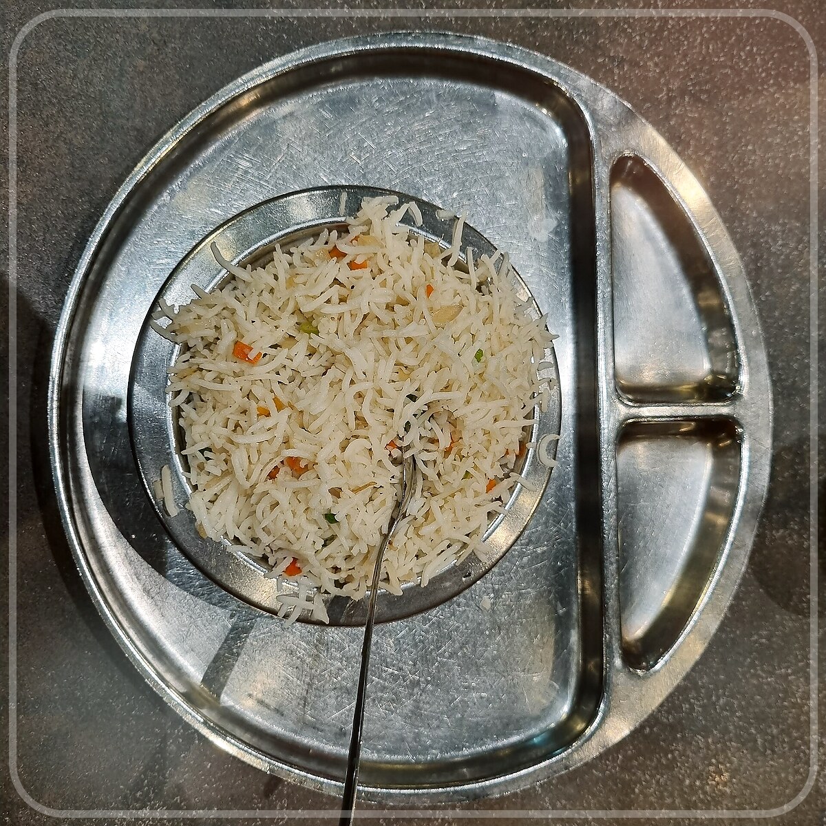 A plated serving of Vegetable Fried Rice